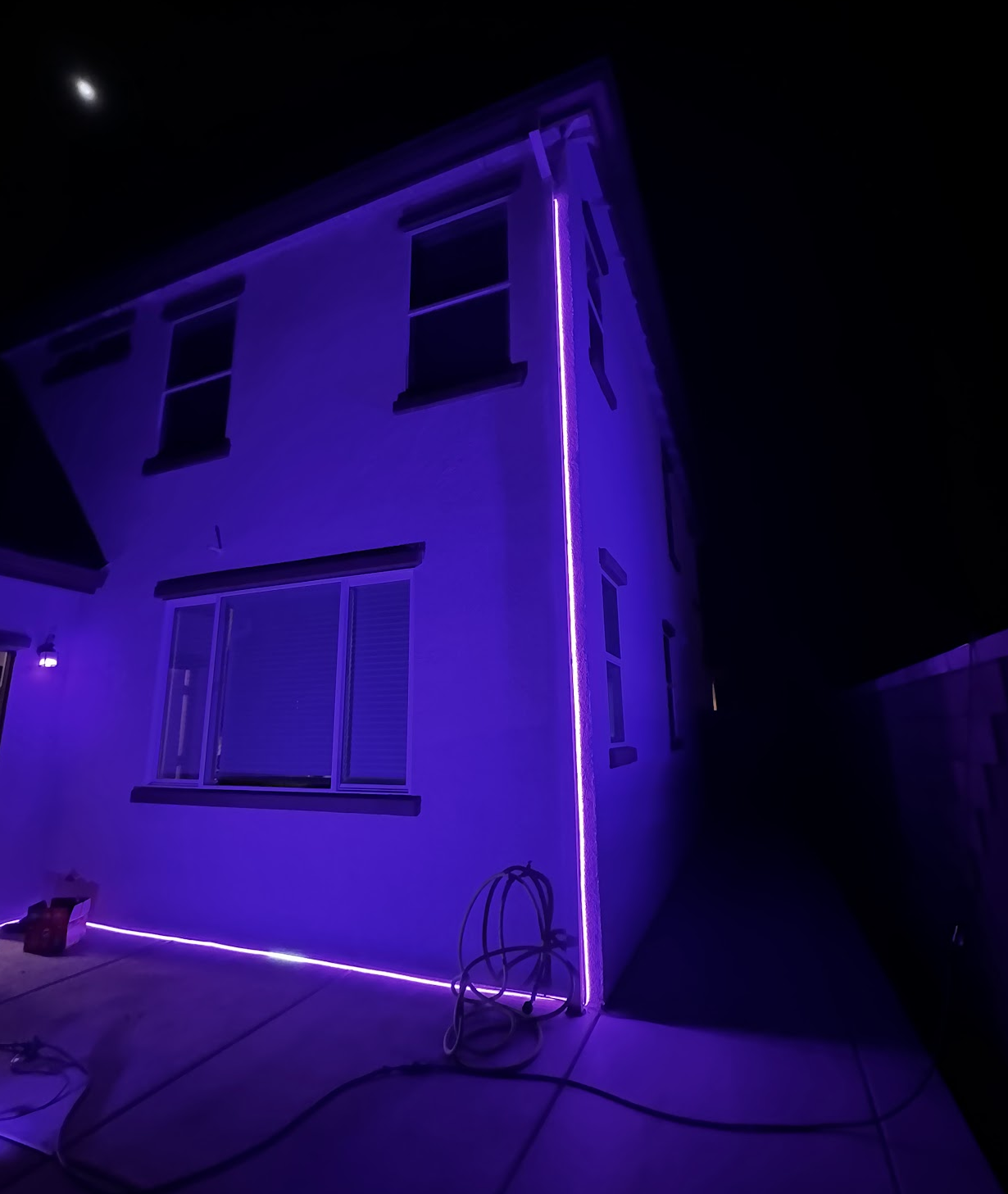 Purple beam lights on the house