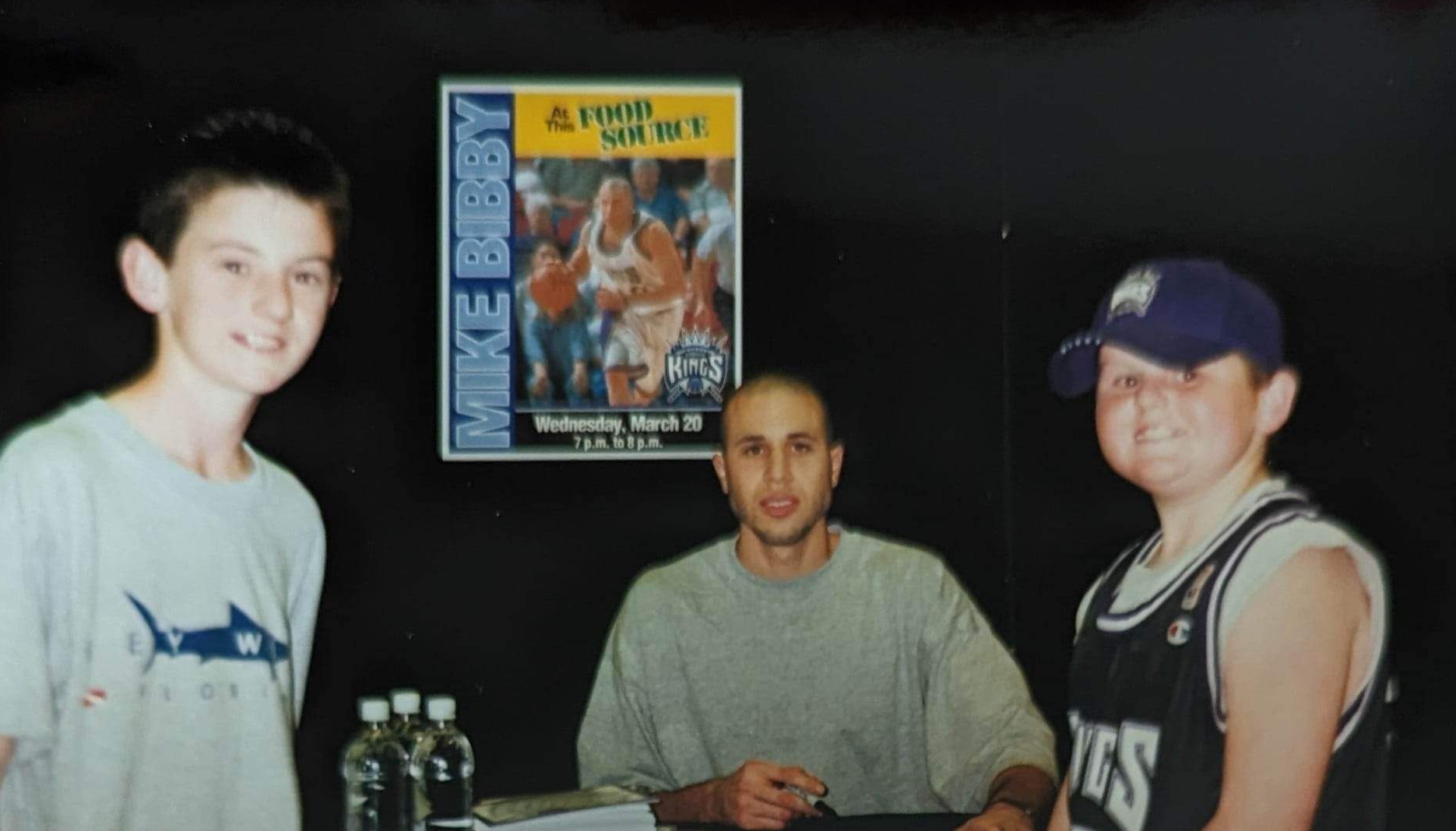 Brendan and his brother with Mike Bibby at Food Source